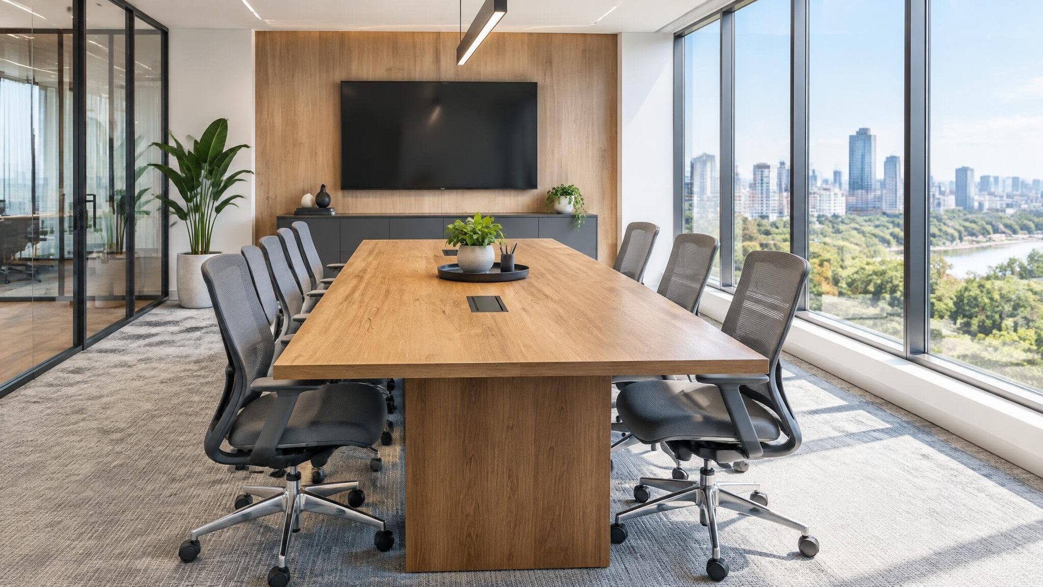 Modern meeting room with a wooden table and chairs