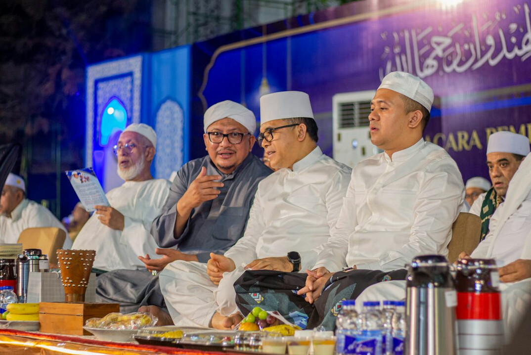 Panel discussion with several speakers seated on stage